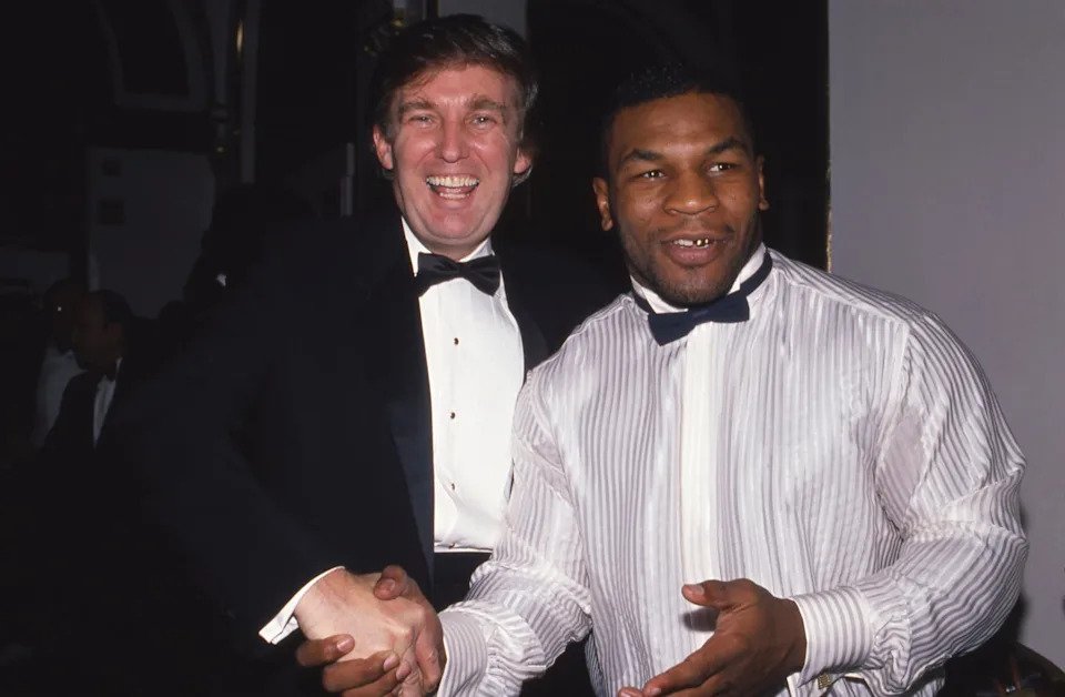 Donald Trump and Mike Tyson attend a  March of Dimes dinner in November 1989 in New York City. More than 30 years later, Trump’s opinions about Tyson, who was jailed for raping an 18-year-old, have come back to haunt him. / Sonia Moskowitz / Getty Images